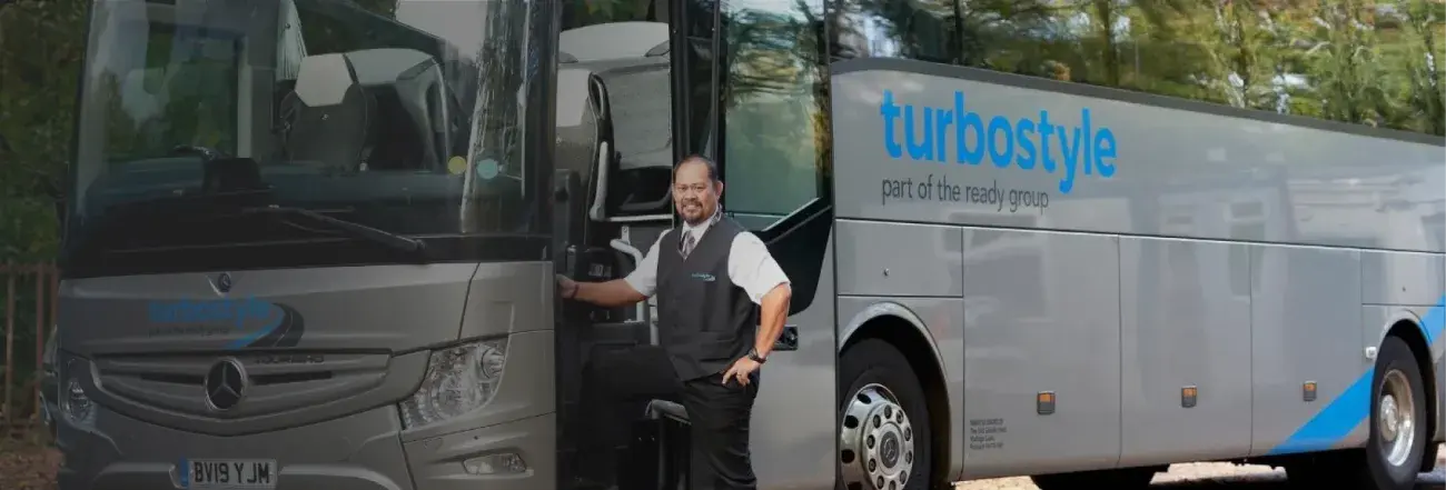 Driver stepping onto Turbostyle coach