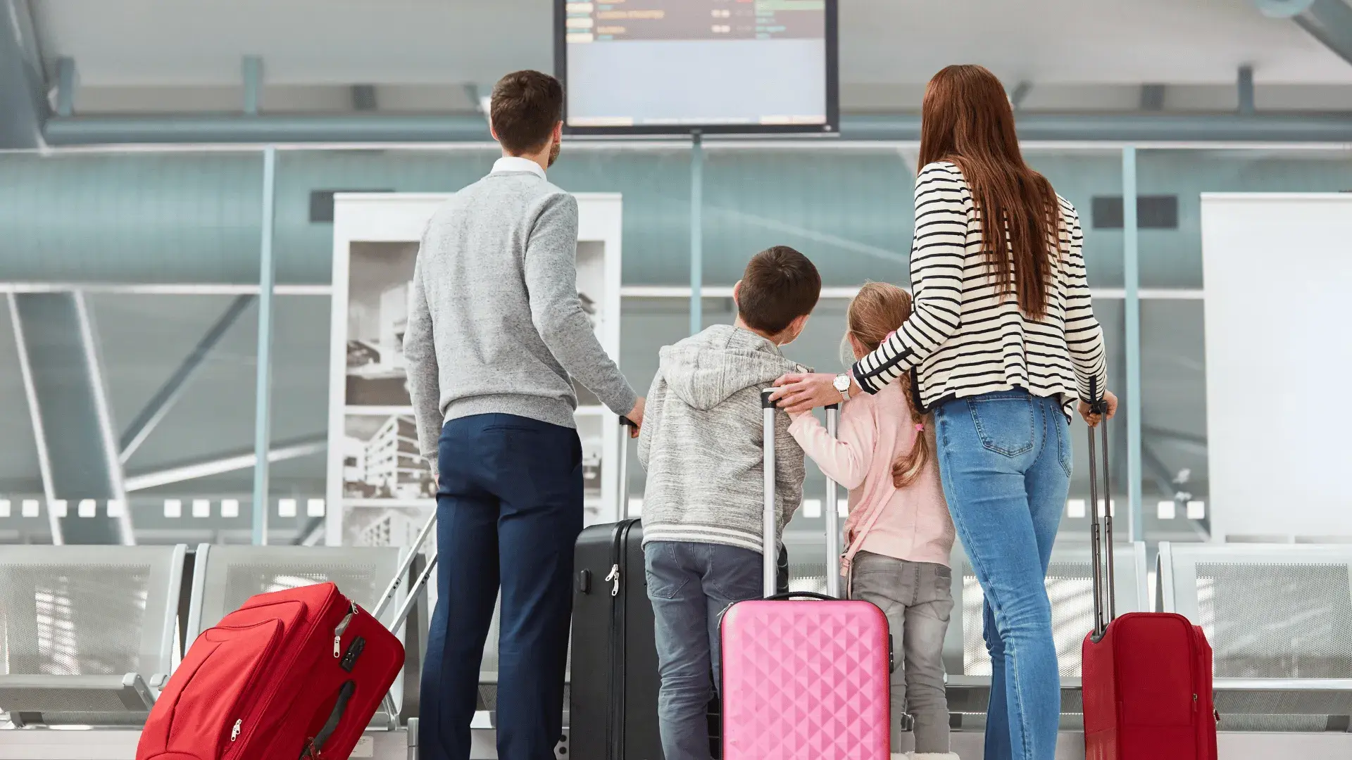 Family at airport entrance